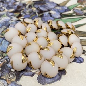 12 Blancos y Dorados